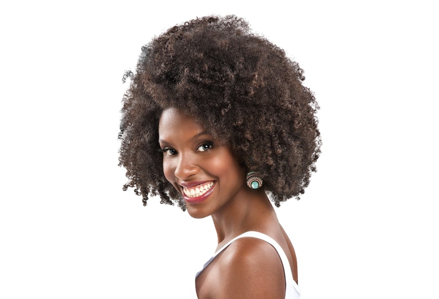 Estilos e Penteados Icônicos para Cabelos Crespos: Do Black Power ao Tapered Cut