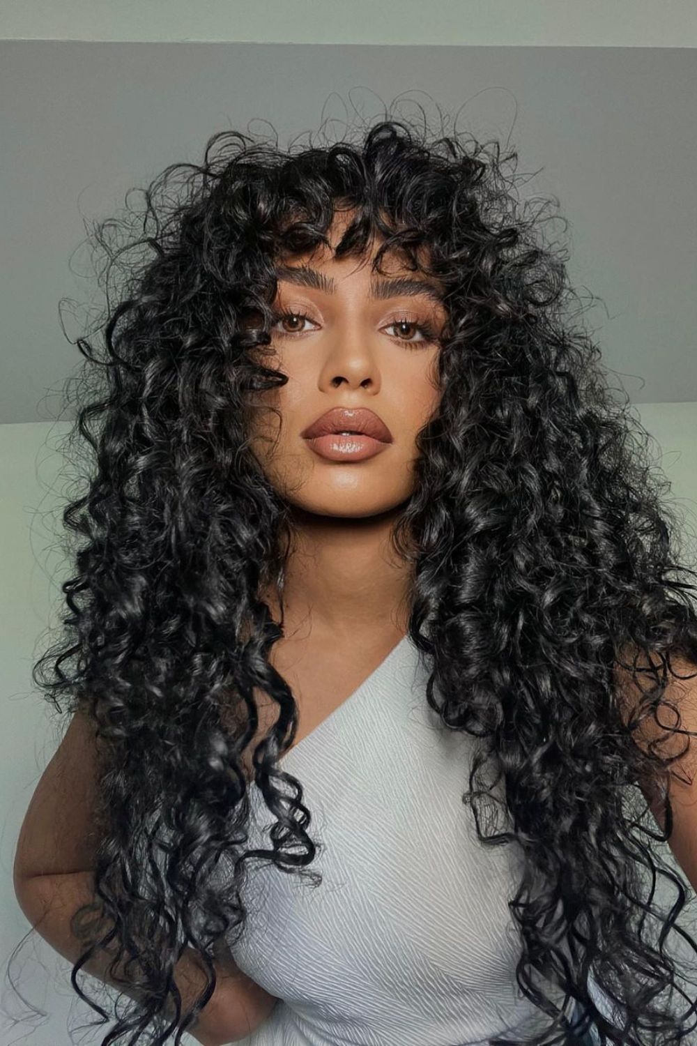 corte que rejuvenesce cabelo ondulado