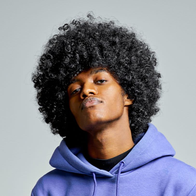 quanto custa um corte de cabelo afro masculino profissional