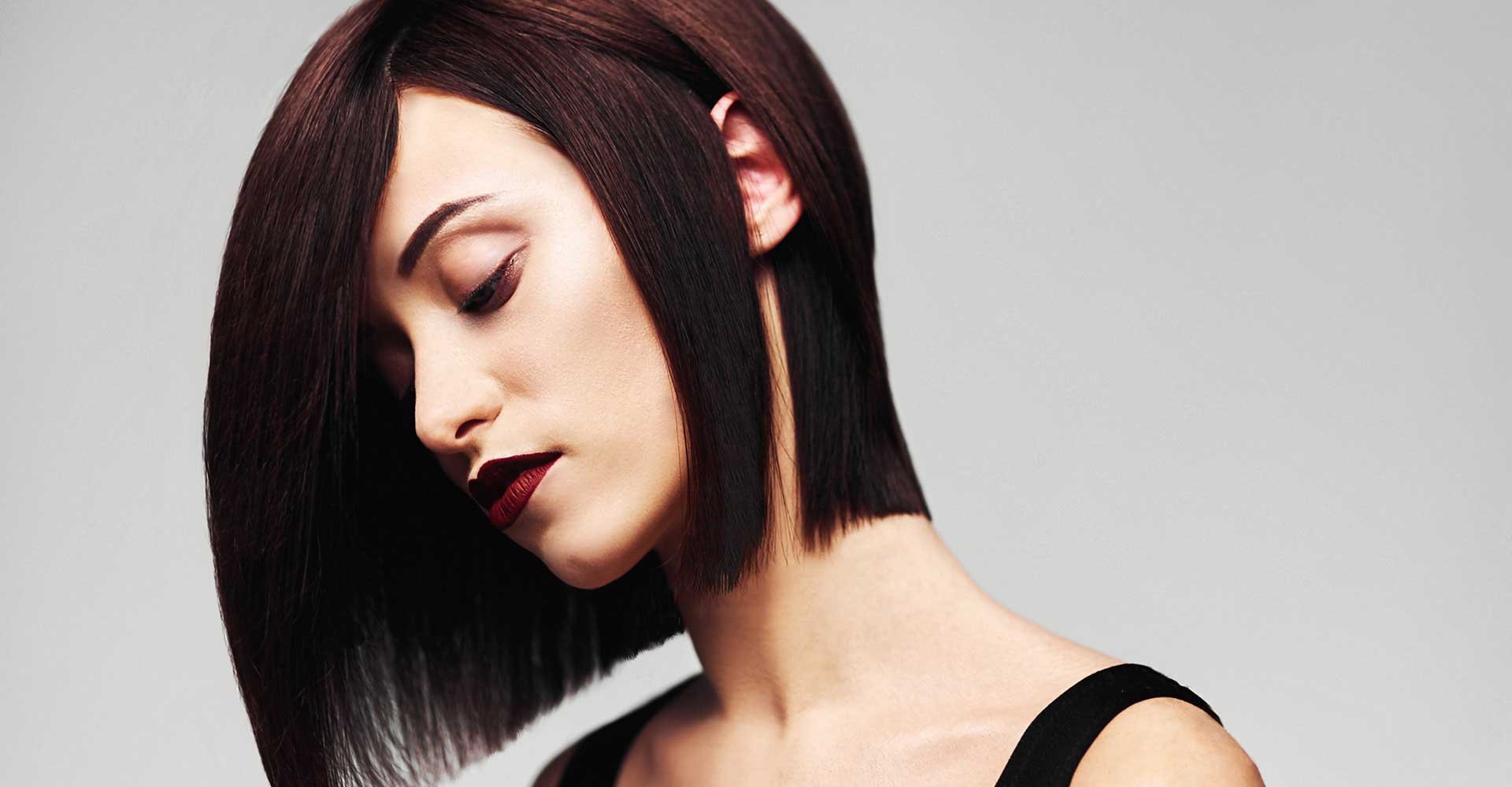 corte de cabelo feminino médio para rosto redondo