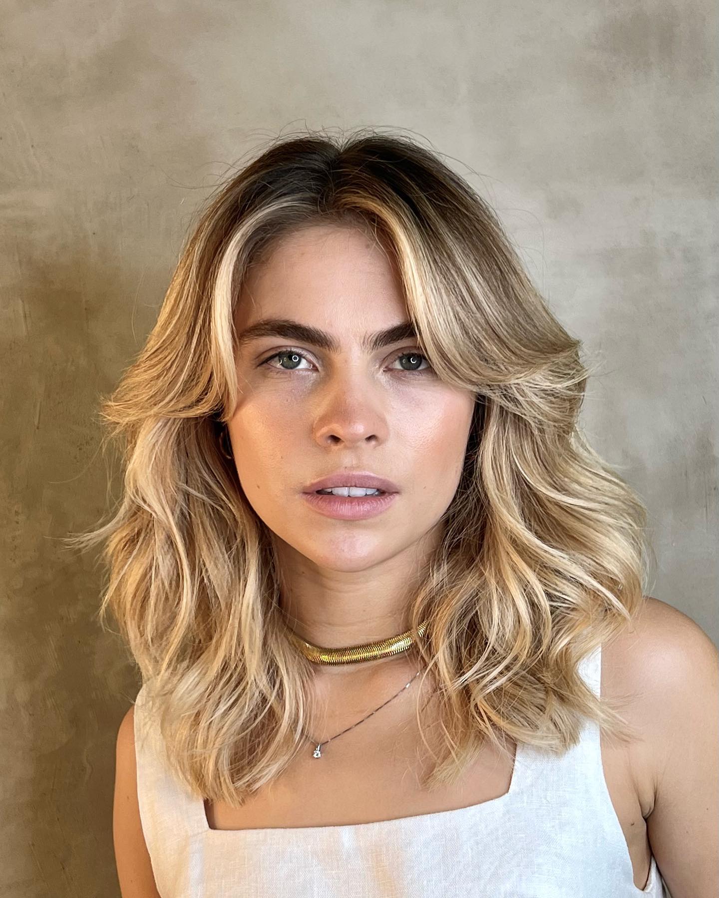 corte cabelo medio feminino para rosto redondo