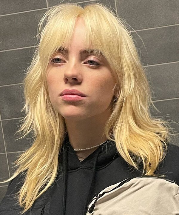 Franjas que Combinam com o Wolf Cut Cacheado: Curtain Bangs e Mais