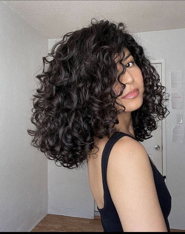 corte cacheado longo feminino