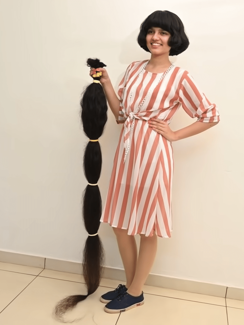 A história por trás do maior cabelo afro do Guinness