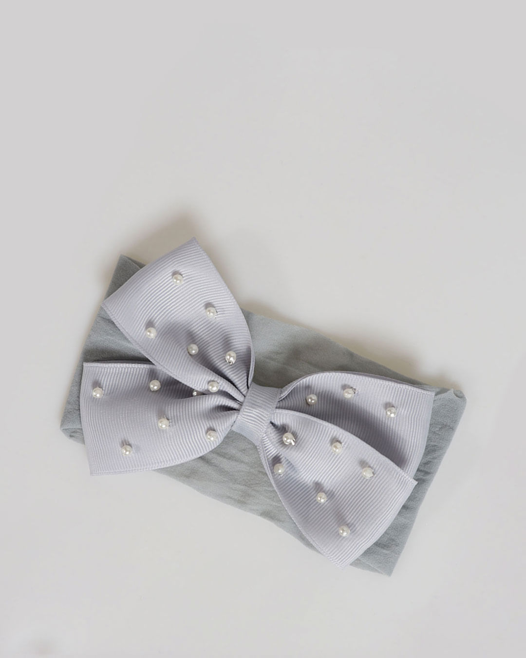 Bico de Pato ou Faixa? O Melhor Laço para Bebês com Pouco Cabelo