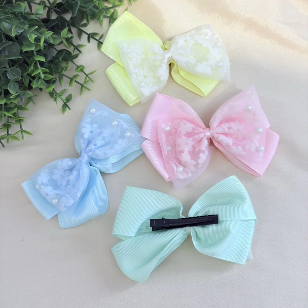 penteado infantil cabelo cacheado com laço