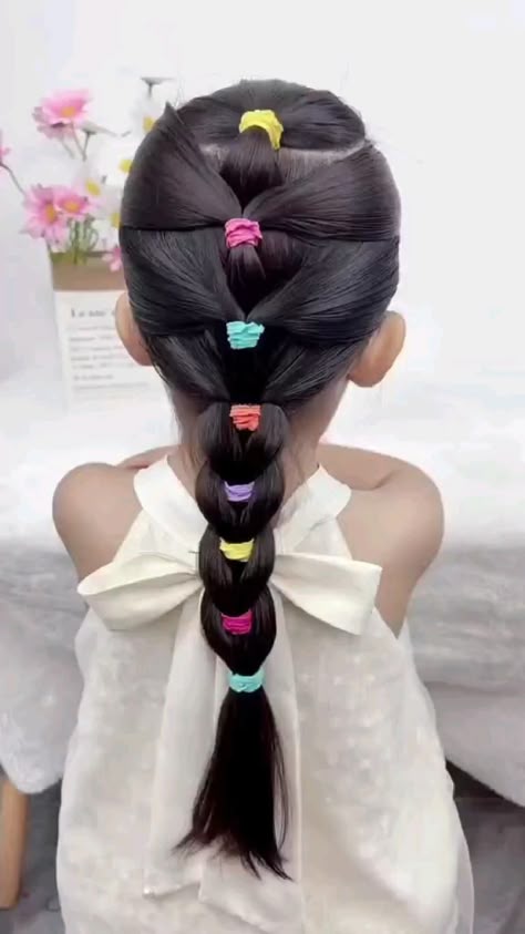 penteado infantil com xuxinha para cabelos cacheados