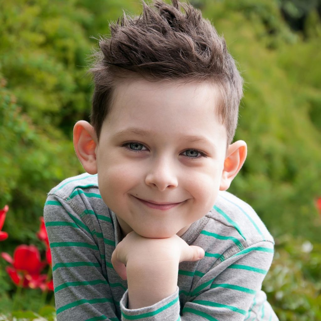 penteado infantil menino cabelo cacheado com trança